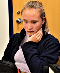 Sparta fifth-grader Erin Alster works on a computer-based math class while in her home district