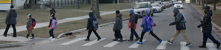 Abbey Road? Nope, Benjamin Avenue SE, as students complete their morning walk to Campus Elementary School 