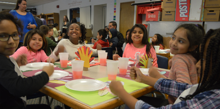 Students wait for their turn to fill their plates