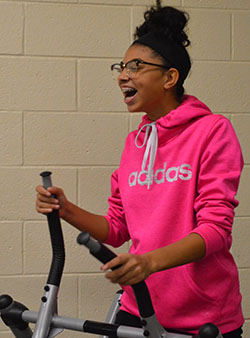 Cydney Hansma uses the elliptical in gym class