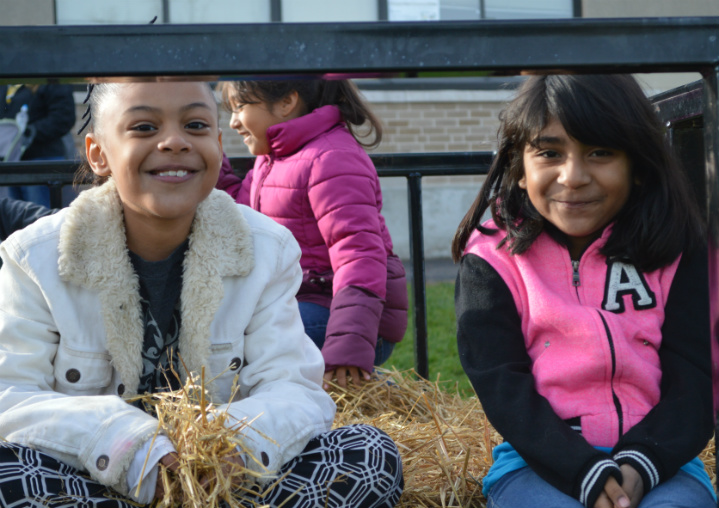 Third-graders Nialeah Sparks and Aliyah Santiago are ready for the hayride