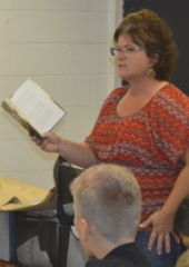 Teacher Kathy Vogel reads aloud the novel “Pax” for her seventh-graders