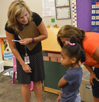 Wyoming’s West Elementary teacher Julie Merrill meets a student for the first time