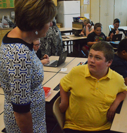 Sue Spahr chats with a student named Joe