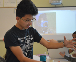 Sophomore James Tran brainstorms cat stroller designs during the 5-Minute Design Challenge