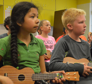 Kelloggsville students learn songs using just four chords