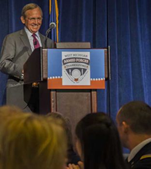 Admiral Olson speaks to luncheon guests