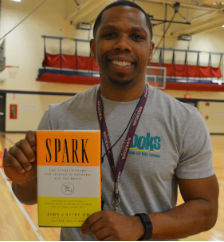 Physical education teacher Brandon Witherspoon uses research from Dr. John Ratey, of Harvard Medical School, in his classes and club, BOKS