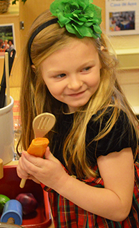 Hanna Cone plays during free time in preschool