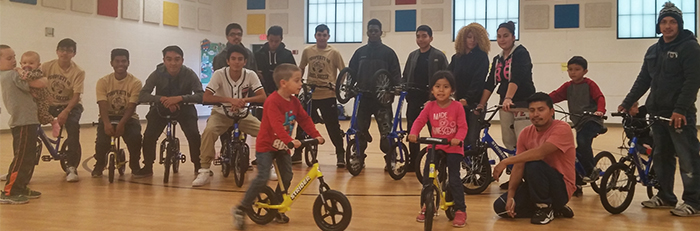 Bike Build Day involved parents and high schools students who assembled the bikes