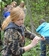 High school senior Liz Smith works with the fourth-graders