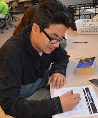 Lee High School freshman Paul Villareal studies vocabulary words