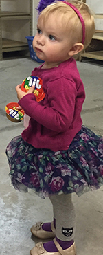 Volunteers (and children) packed nutritious items