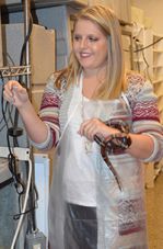 Senior Anne Dunbar introduces girls to the animals she helps care for at East Kentwood High School