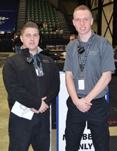 Criminal justice students Matt Schievink, left, and Jonathan Shereda help the security firm to make sure events run smoothly