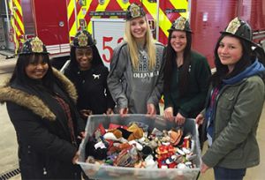 The girls donated stuffed animals for firefighters to give to children