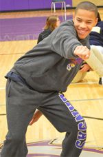 Eighth-grader Brandon Ratliff dances in class