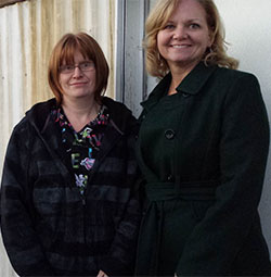 Flossie Bliss, left, gets help in her financial challenges from Jodi West of Kent School Services Network 