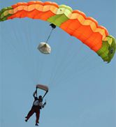 Principal Michael Gelmi flies down after jumping out of the plane