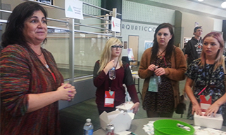 Artist Linda Ragsdale, survivor of a terrorist attack in India in 2008, talks to students about her Peace Dragon project during a breakout session at TedxGrandRapids Livestream for Education. Ragsdale was a Tedx speaker in 2012