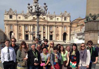 Comstock Park World History Teacher Betsy Rybarczyk and her students in Vatican City