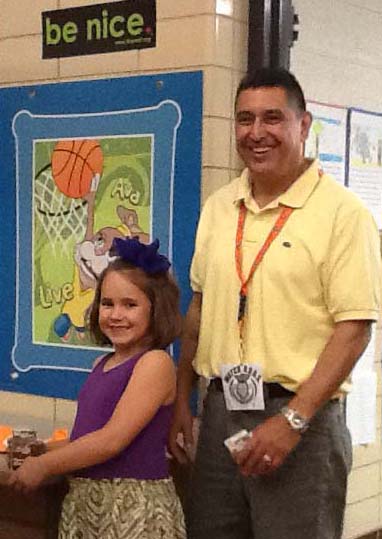 Watch DOGS volunteer Able Soto and granddaughter Kylie Soto, 6, wait in line for lunch