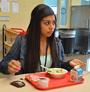 Eighth-grade student Reyna Delgado takes her turn answering a question