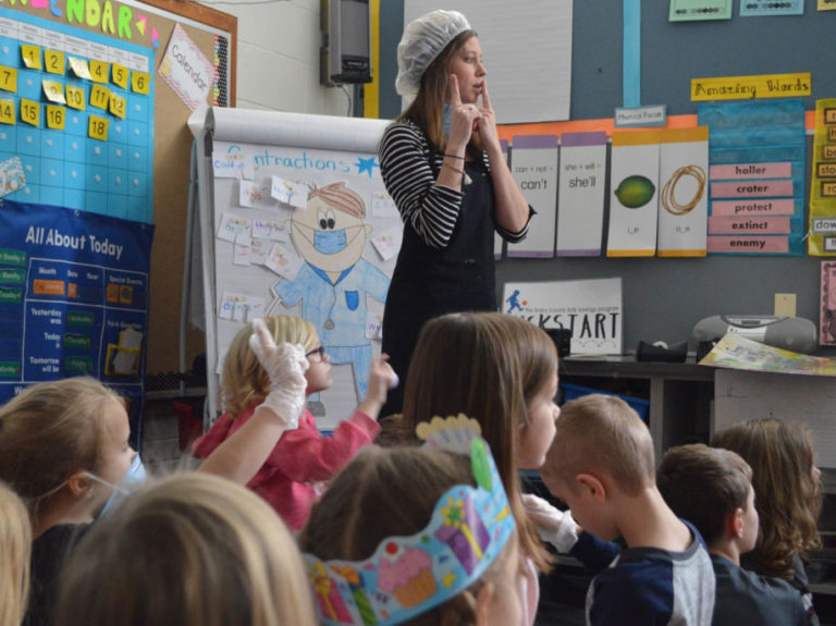 To make contractions fun, first-grade teacher Brittany Brown uses surgical masks, latex gloves and Band-Aids to teach the lesson