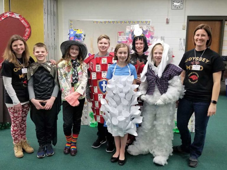 Members of the Cedar Springs Division II Odyssey of the Mind team are, from left, parent coach Traci Slager, seventh-grader Aiden Lake, sixth-graders Annalise Elliott, Brielle Sarniak, Nate Slager and Coryn Wiles, eighth-grader Jade Yowtz, and long-term coach Michelle Wiles
