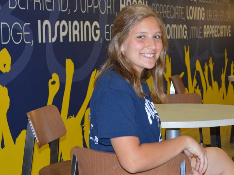 Toughing it out through troubled times, she sets her sights on college