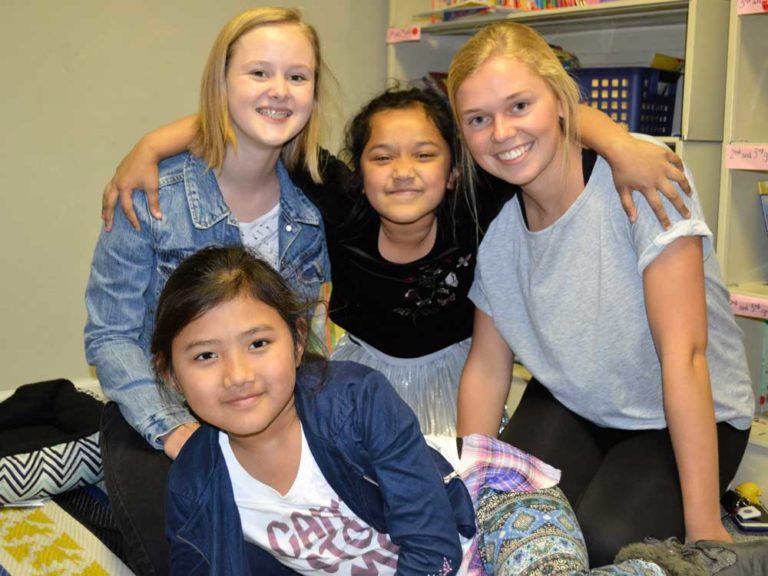 Students help refugee peers adjust to life, schools in the U.S.