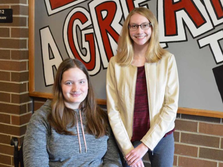 Family and friends pushed her to excel, grad says