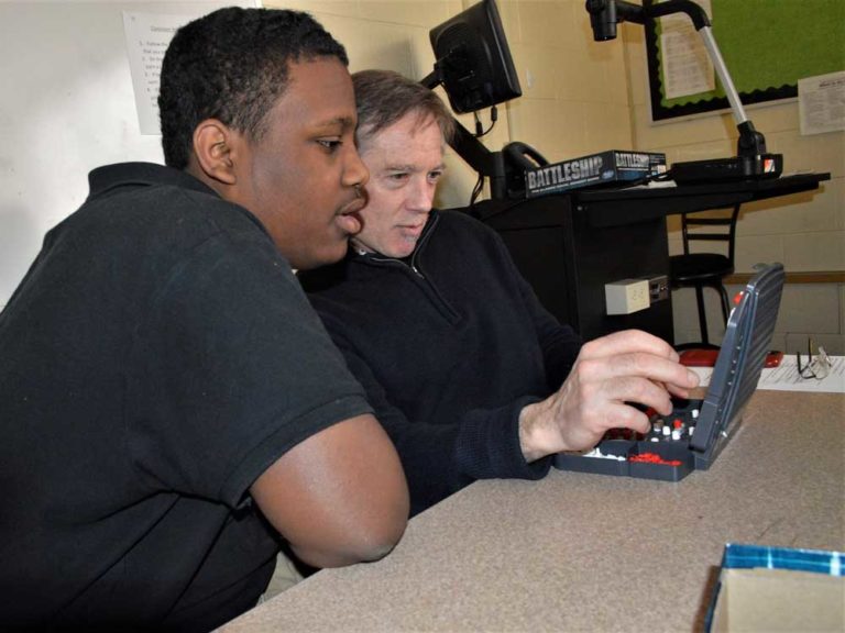 Community mentors help eighth-graders cope with stress, handle classes and think about college