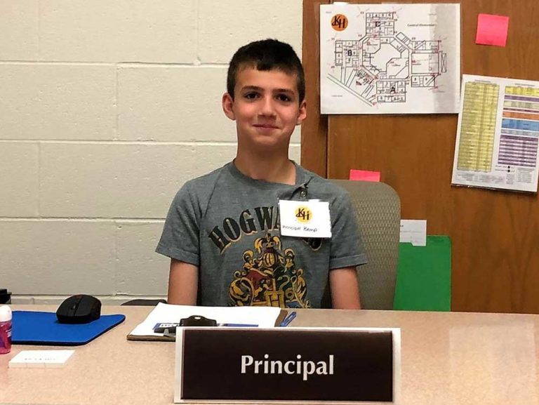 Fringe benefits of top test scores: bagels and the principal’s desk