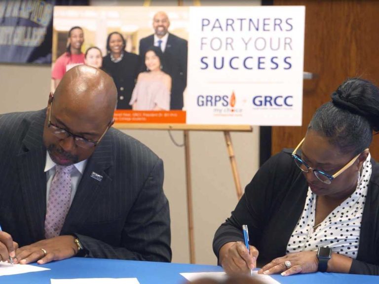 GRCC President Bill Pink and GRPS Superintendent Teresa Weatherall Neal signed on to provide more college opportunities for students