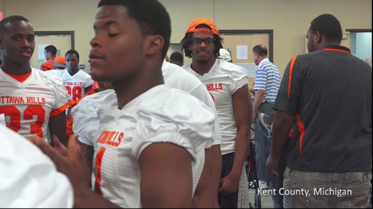 Working hard on the field, and giving back off of it