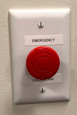 Each building is equipped with a panic button that shuts down access to the building