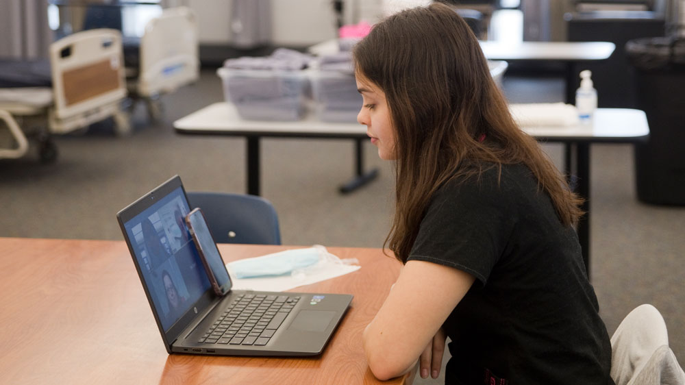 Health Career Foundations student Jasmin K. Landero-Mottus, 11th grader at Lee High School, participates in the first-ever virtual version