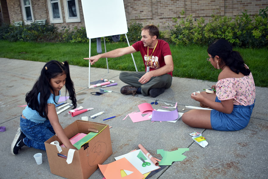 High School Science Teacher Aaron Higley helped students with rocket-building at last year’s program