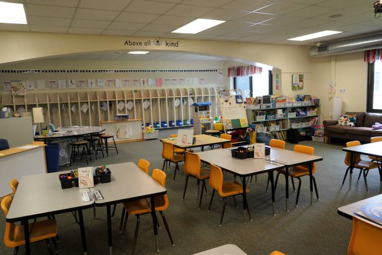 Flexible seating in Kelly Peterson’s Caledonia kindergarten classroom features chairs with backs, stools with no backs and a couch in the reading corner 