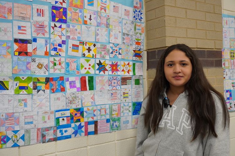 Paper quilt stitches cultures together as one colorful community