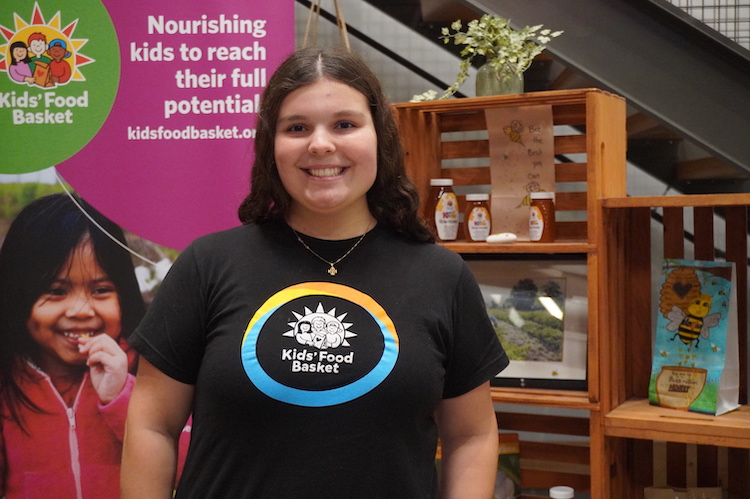 Maria started volunteering with Kids’ Food Basket with her family