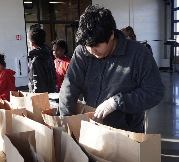 TEAM 21, nonprofit & local business prepare meals for community - School News Network