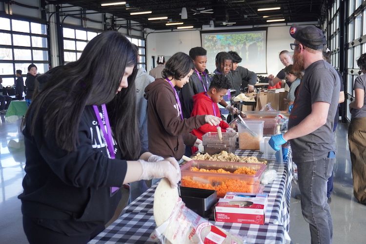 TEAM 21, nonprofit & local business prepare meals for community - School News Network