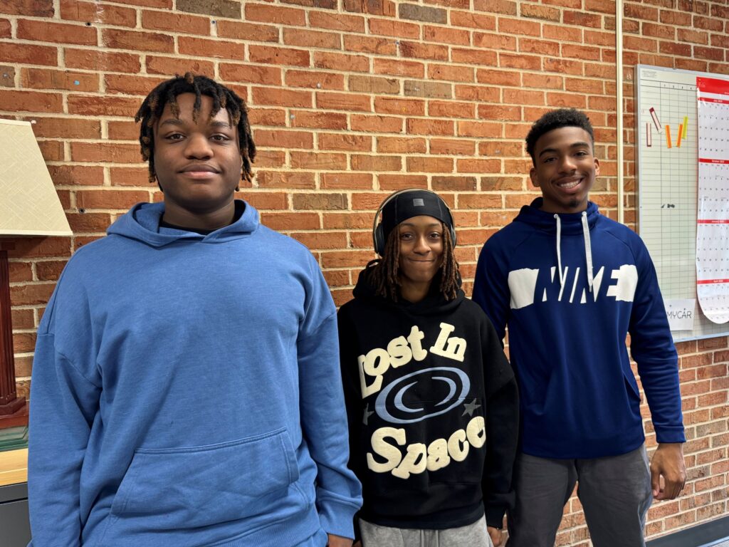 Three high school students stand together at Union High School