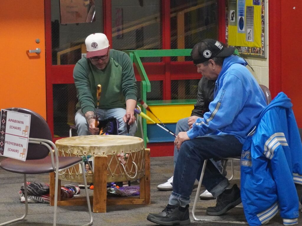 A tribal drumming group performs at the NAEP Library.
