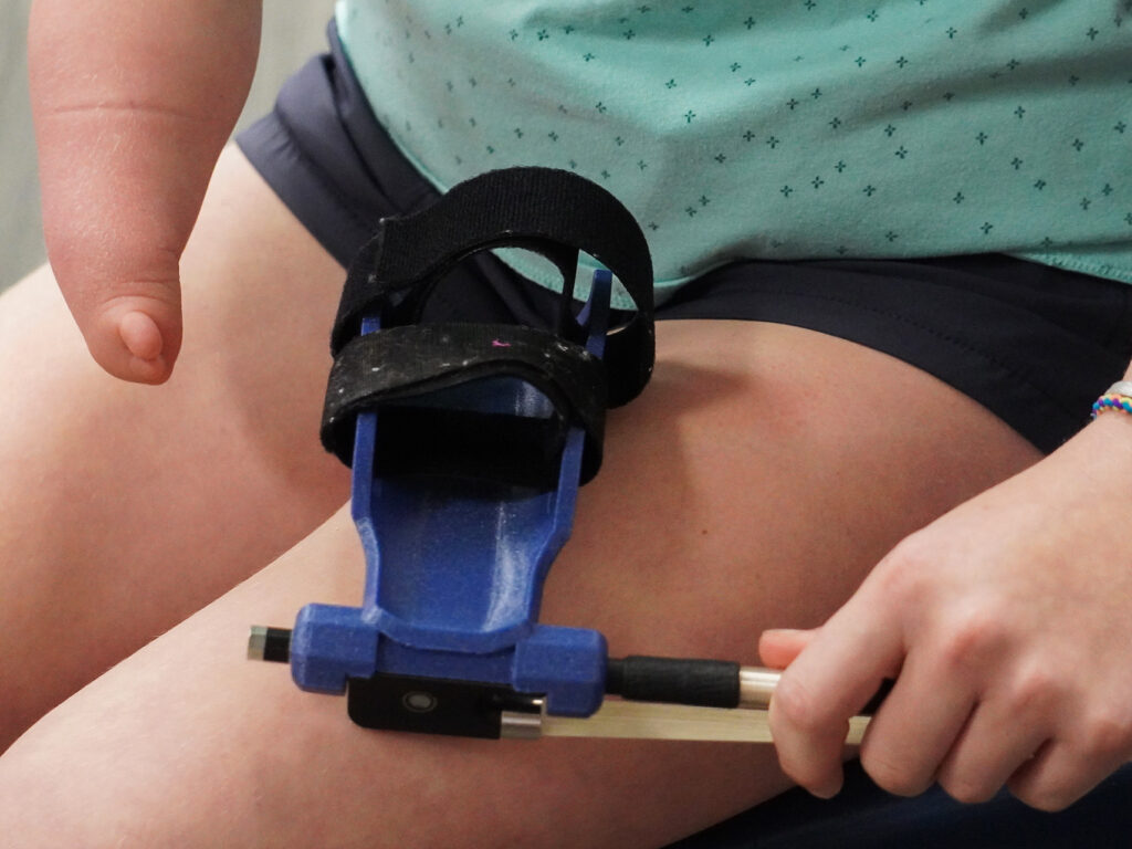 A 3D-printed device used to hold a cello bow